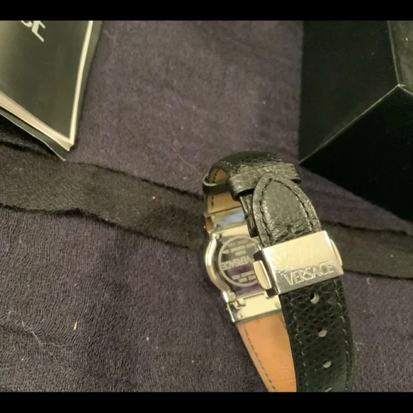 original VERSACE round silver face with black leather strap